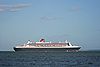 QM2 passing Calshot Spit light.JPG