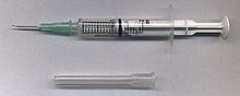Syringe with needle and needle cap.jpeg